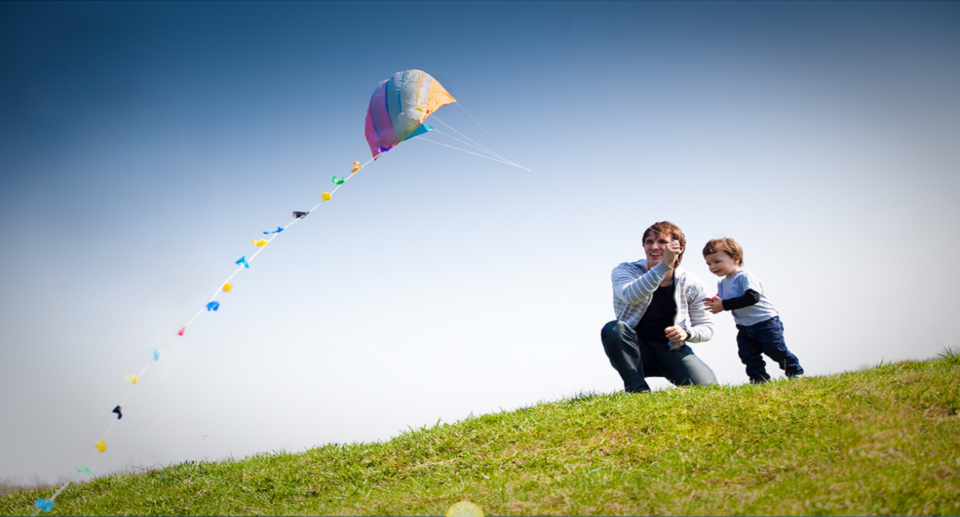 family flying kite